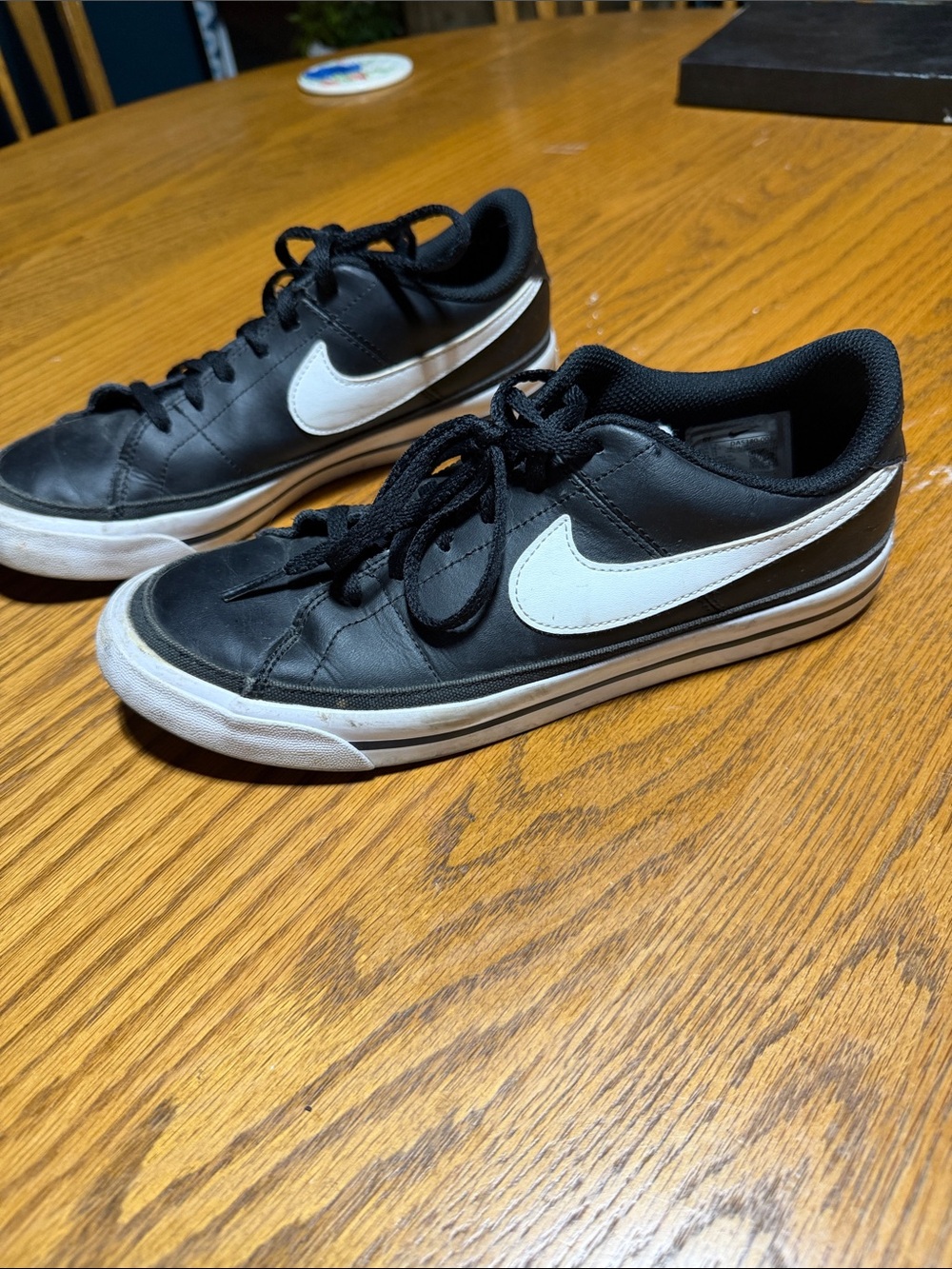 Nike Kids Black Sneakers with White Swoosh